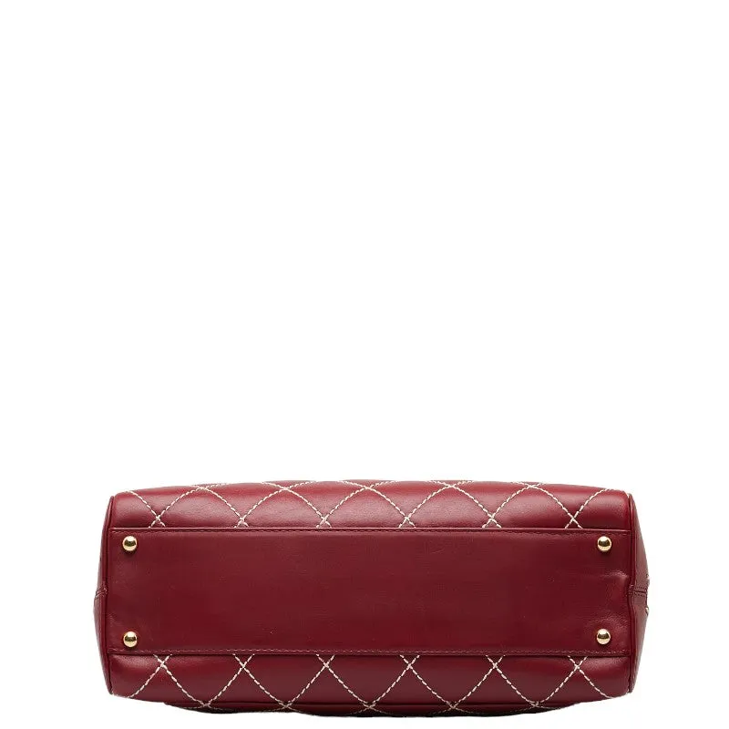 Chanel CC Wild Stitch Leather Mini Boston Bag Leather Handbag in Good condition